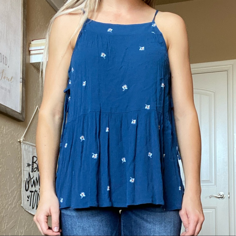 Blue tank with small flowers